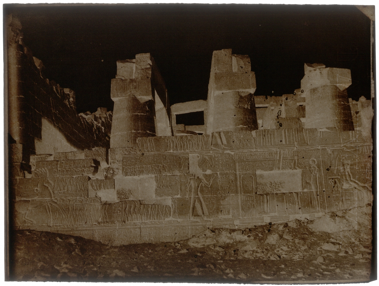 John Beasley GREENE (American, born in France, 1832-1856) Great Hypostyle Hall, outer face, north wall, Karnak, 1854-1855 Waxed paper negative 24.0 x 31.8 cm  Watermark "J Whatman"