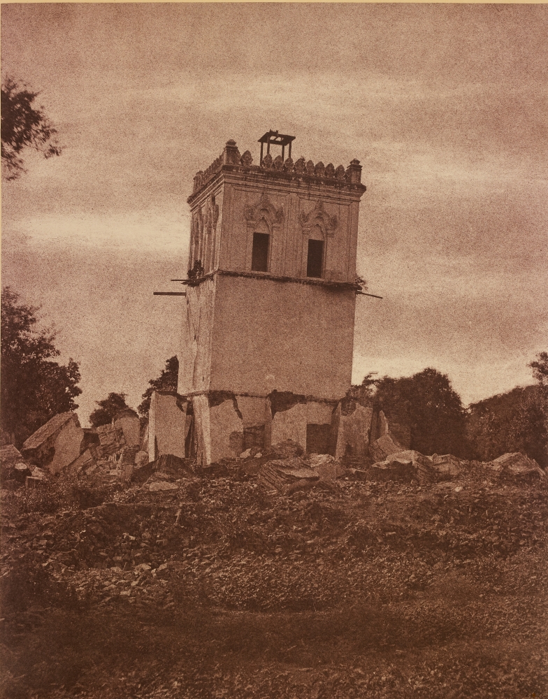 Captain Linnaeus TRIPE (English, 1822-1902) "No. 37. Ava. Tower of the Palace." Burma, 1855 Albumenized salt print from a waxed paper negative 33.7 x 26.6 cm mounted on 58.4 x 45.7 cm paper Signed "L. Tripe" in ink. Photographer's blindstamp and printed label with plate number, title and "This is the only co-herent remains of the palace. The earthquake of 1839 covered the ground with the rest of it and tilted this considerably." on mount.
