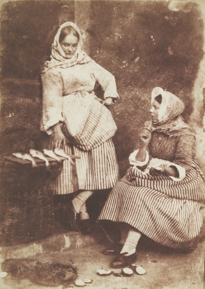 David Octavius HILL & Robert ADAMSON (Scottish, 1802-1870 & 1821-1848) Jeanie Wilson and Annie Linton, Newhaven, "They were twa bonnie lasses", circa 1845 Salt print from a calotype negative 19.0 x 13.6 cm mounted on 37.4 x 26.2 cm grey paper "58" noted in pencil on mount verso