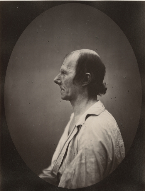 DUCHENNE DE BOULOGNE and Adrien TOURNACHON (French, 1806-1875 & 1825-1903) Portrait of the old man in profile*, 1862, negative, circa 1856 Albumen print from a glass negative 22.1 x 16.5 cm oval on 22.8 x 17.5 cm paper, mounted on 41.0 x 27.3 cm paper
