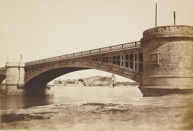 Édouard-Denis BALDUS (French, 1813-1889) "Tarascon. Viaduc", 1855 Albumen print from a paper negative 36.2 x 54.0 cm mounted on 45.5 x 60.8 cm paper Title and signature "E. Baldus" stamped on mount
