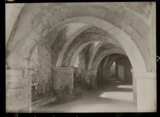 Frederick H. EVANS (English, 1853-1943) "Gloucester Cathedral. Crypt and steps out", 1890 Lantern slide 5.1 x 6.9 cm on 8.2 x 8.2 cm glass slide Signed "F. H. Evans", titled and dated with "83." and "X" in white ink on the paper mask